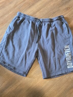 DOYOUEVEN Men's Blue Athletic Drawstring Shorts with Side Logo